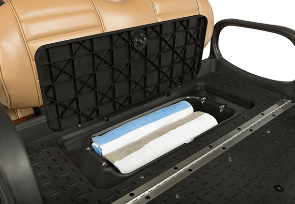 Under seat storage compartment towels
