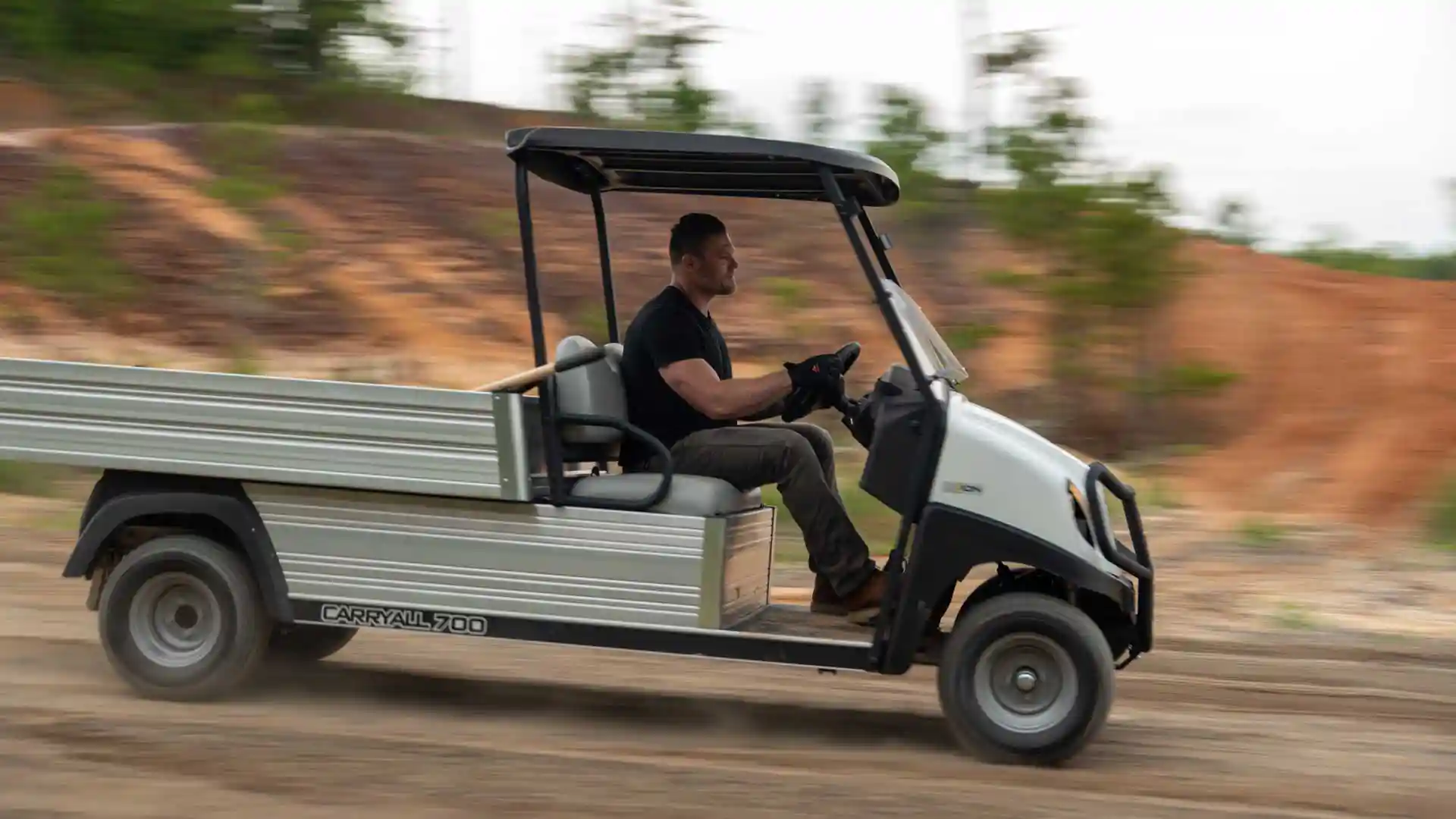 Carryall 700 work utility vehicle in motion