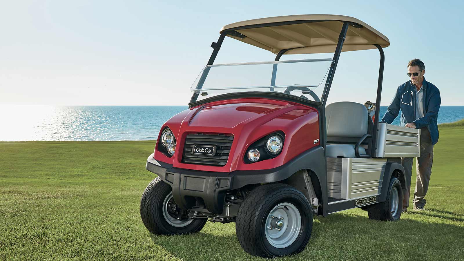 Golf course utility vehicle Carryall 500 turf utility vehicle on golf course