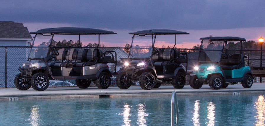 Three Onward golf carts at pool 897x427