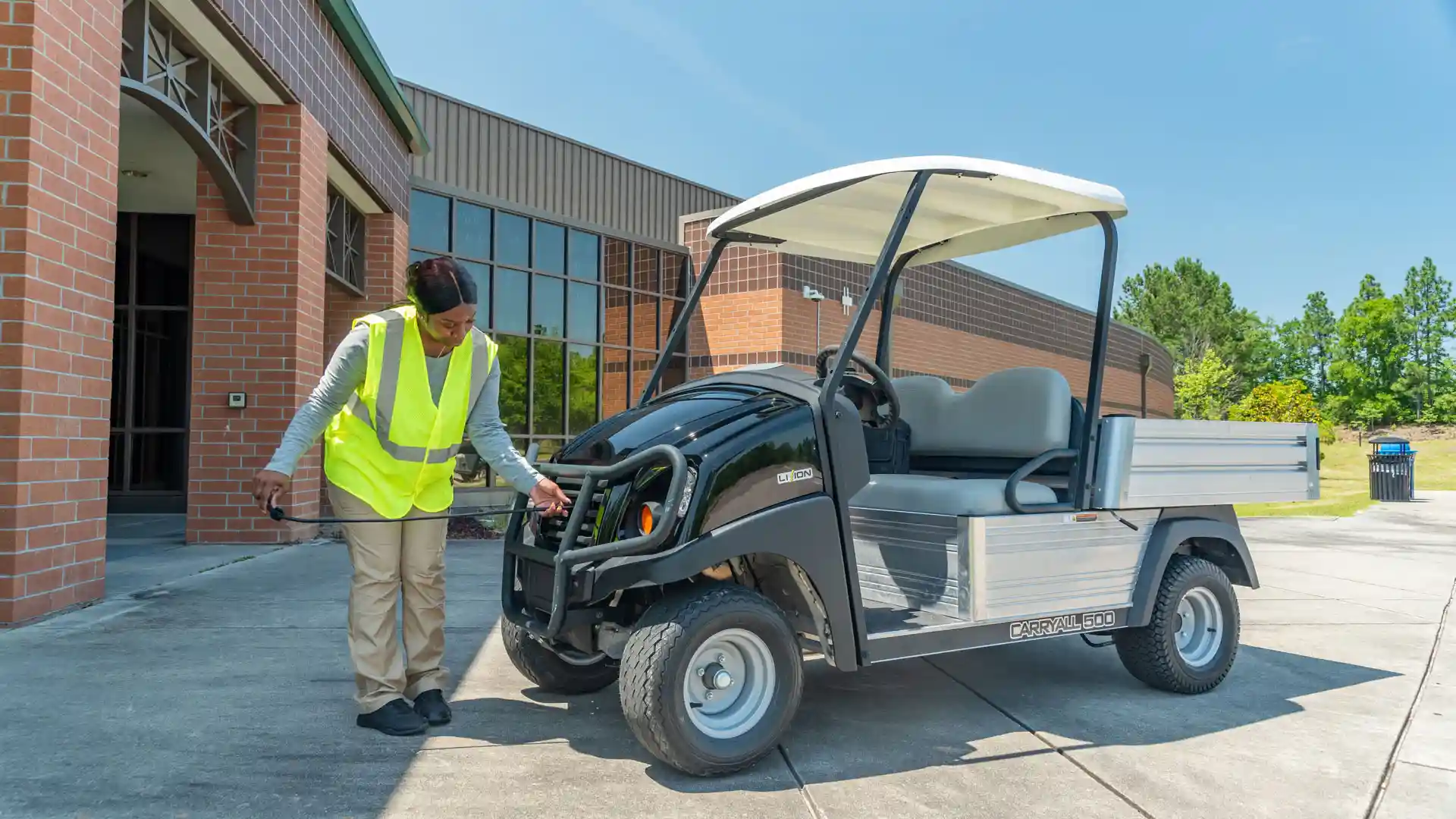 Carryall 500 gas or electric utility vehicle at university campus