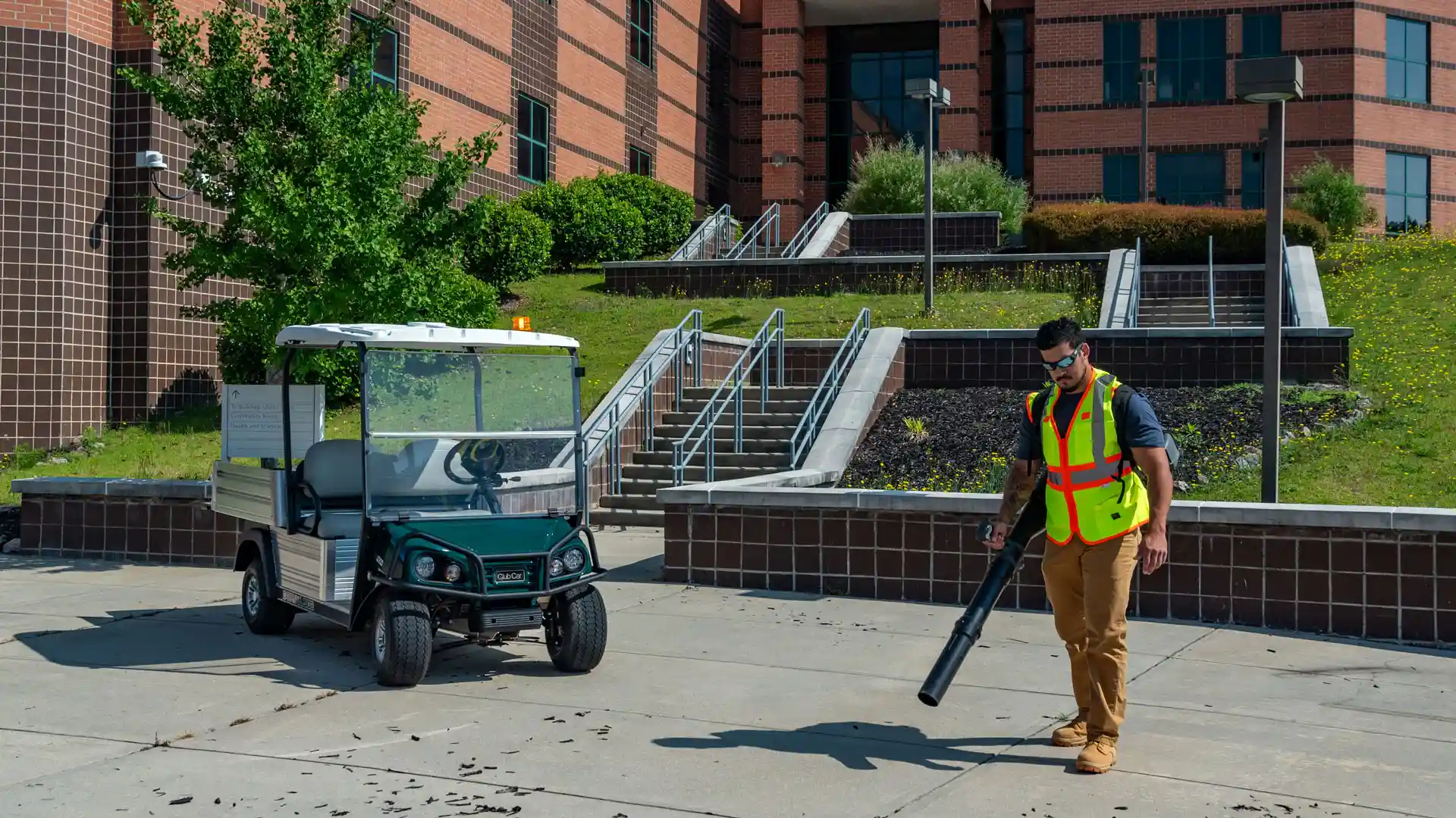 Carryall 502 work utility vehicle with groundskeeper