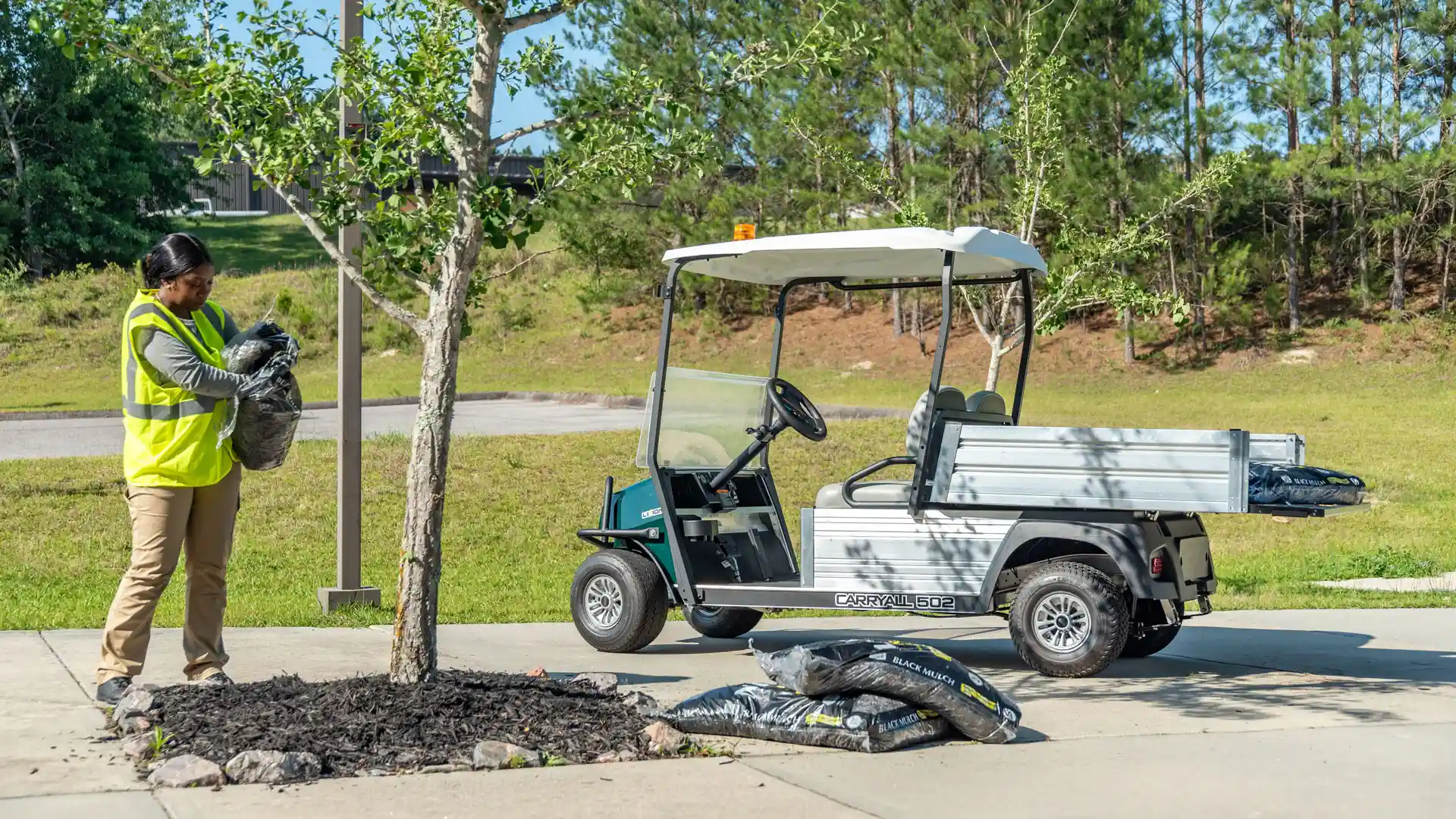 Carryall 502 work utility vehicle with bed for carrying supplies
