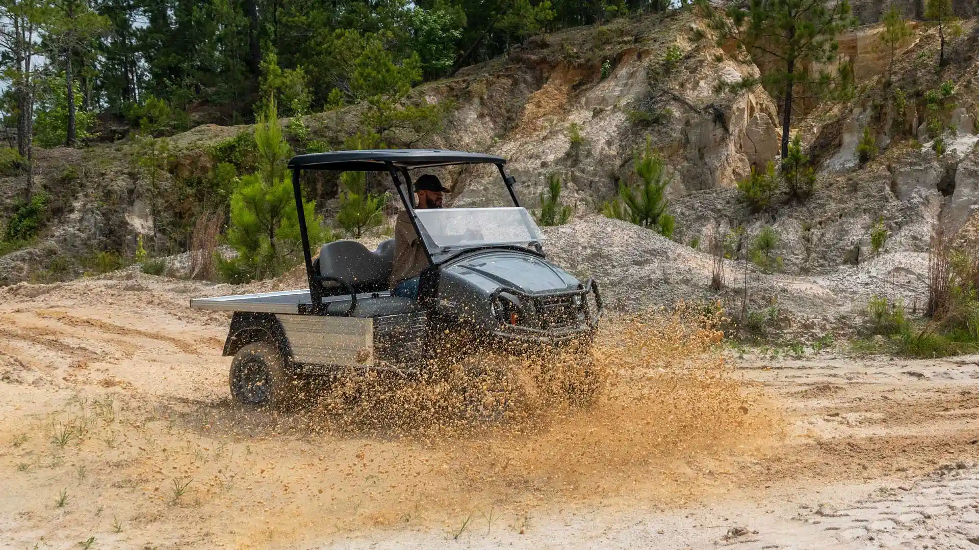 Carryall 550 work utility vehicle on rugged terrain