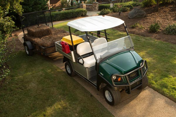 Carryall 500 electric utility vehicle with lithium towing trailer