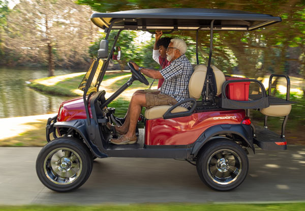 lifted 4 passenger Onward golf cart in motion