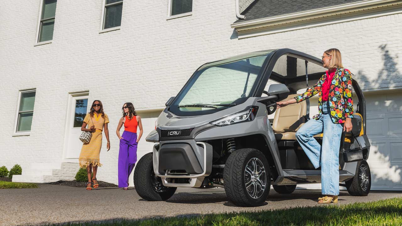 CRU neighborhood electric vehicle (NEV) in driveway