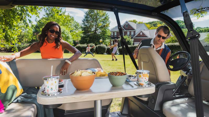 Club Car Cru NEV interior shot with table
