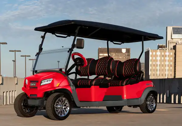Four seater red golf cart