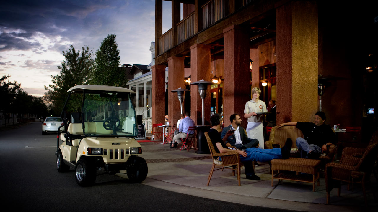 Street legal 4 passenger golf cart at cafe