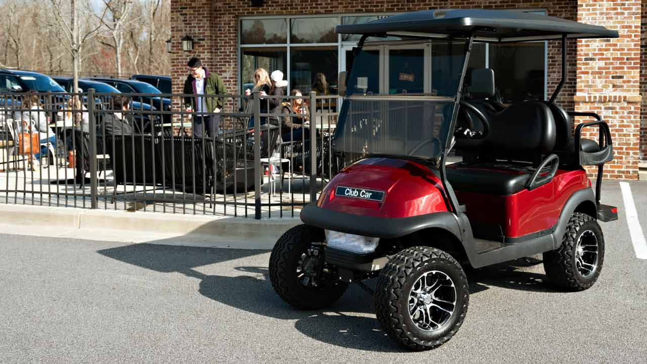 Lifted 4 passenger golf cart